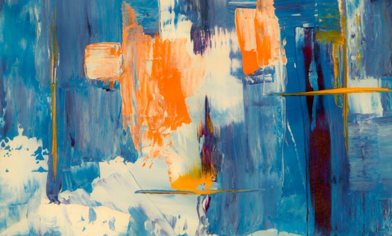 blue white and orange abstract painting